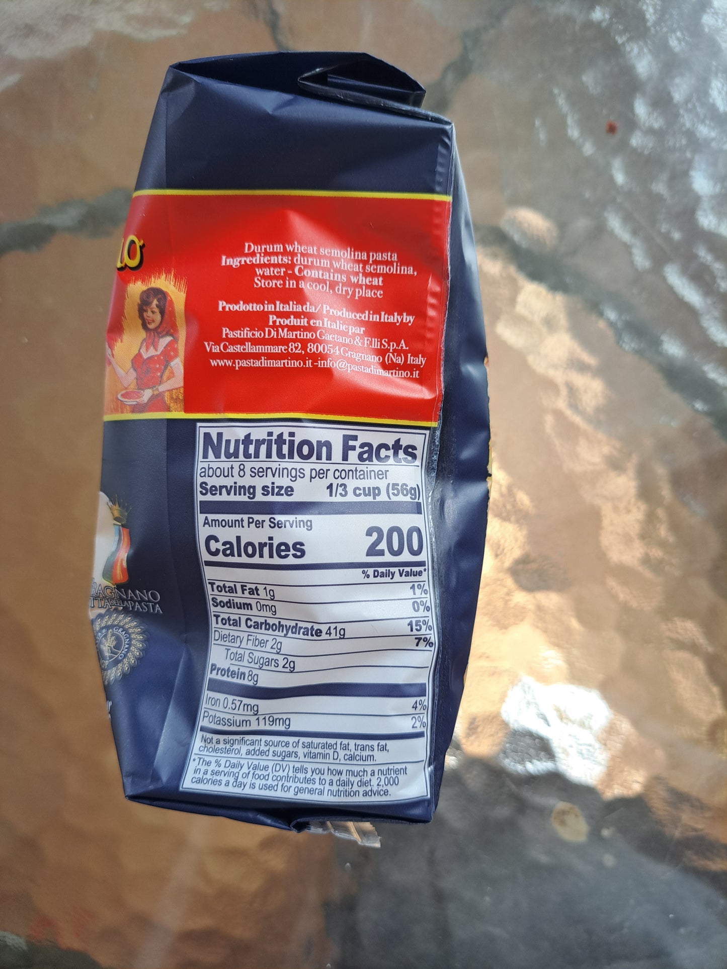 Pasta bag with nutrition facts label on a reflective surface