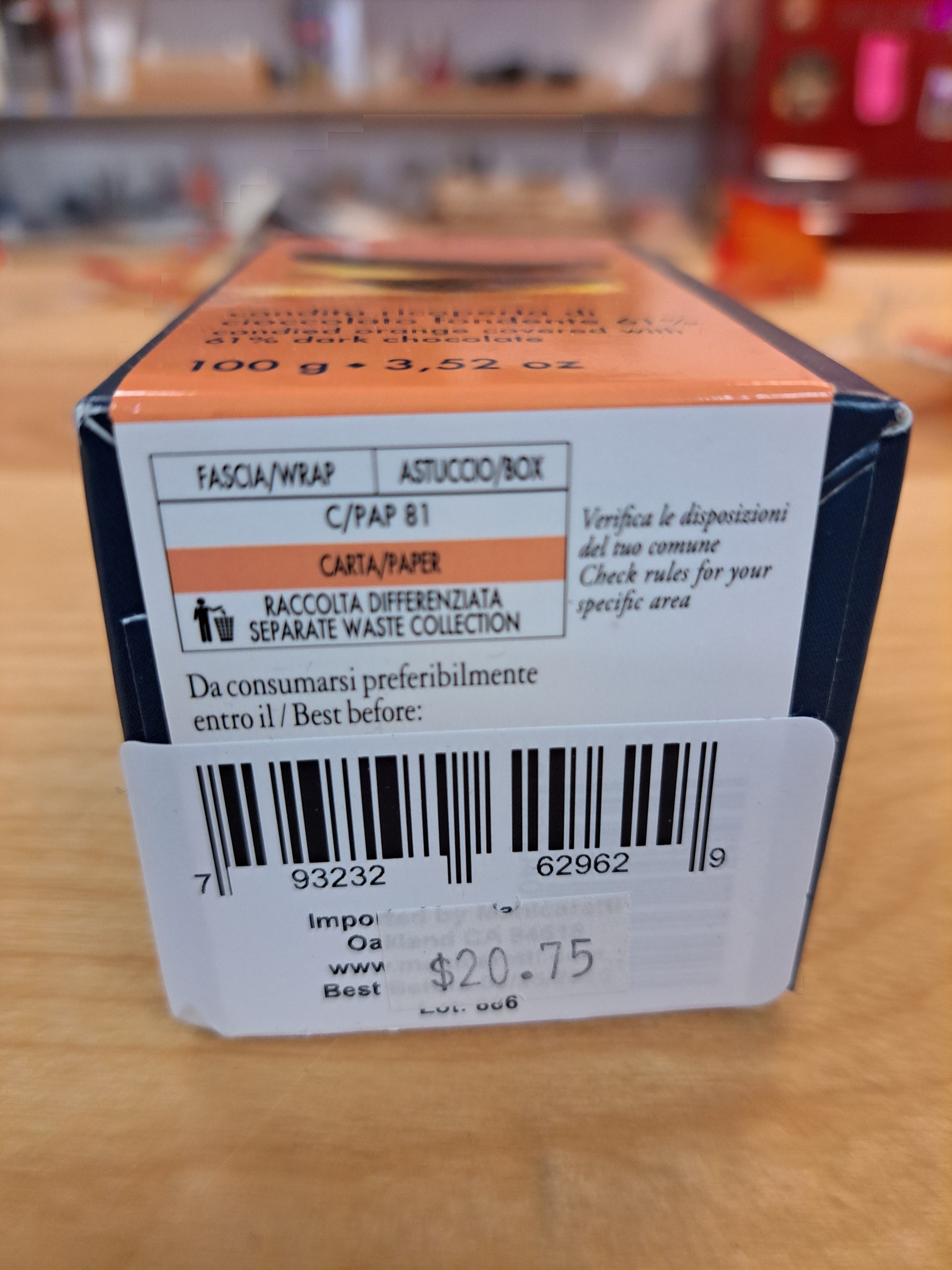 Product packaging with a barcode on a wooden surface