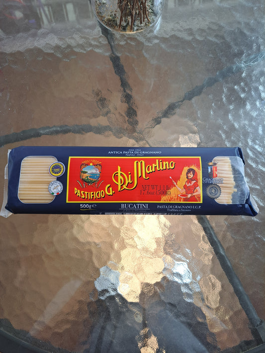 Di Marino pasta package on a reflective surface