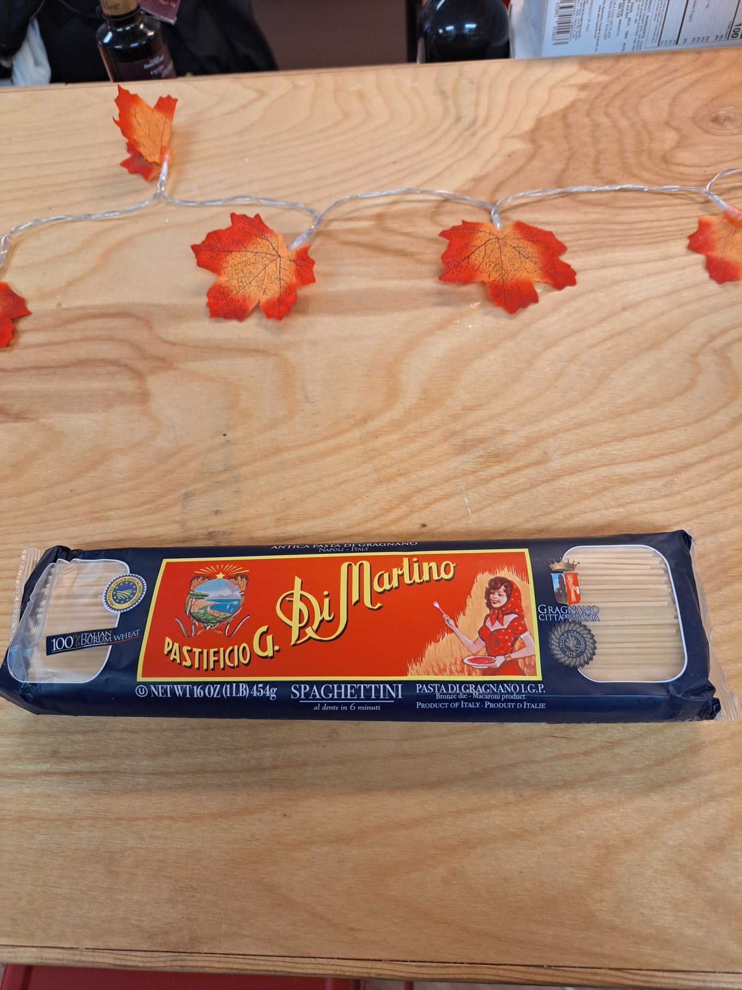 Packaged product on a wooden surface with decorative elements