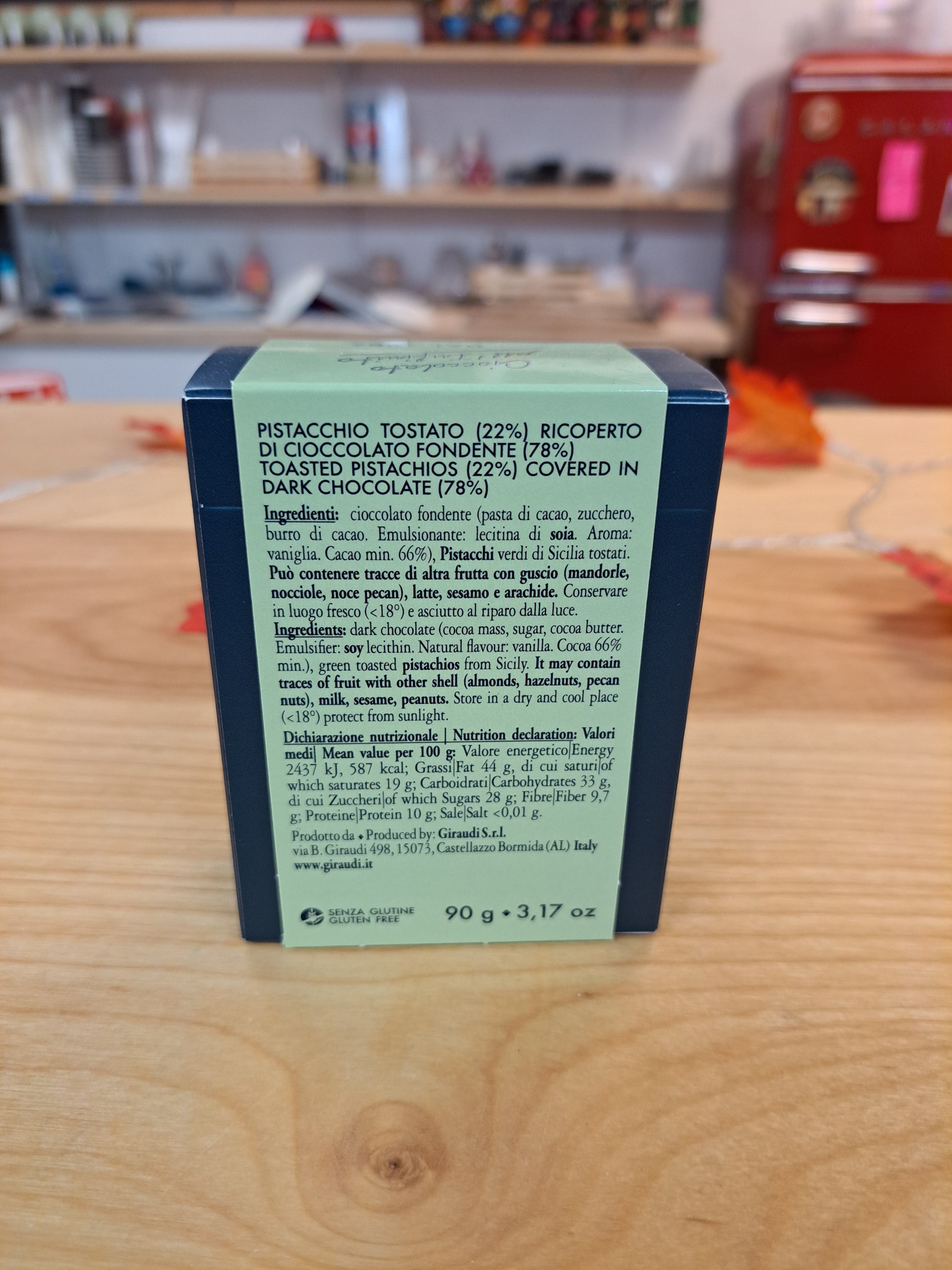 Product packaging with text on a wooden surface