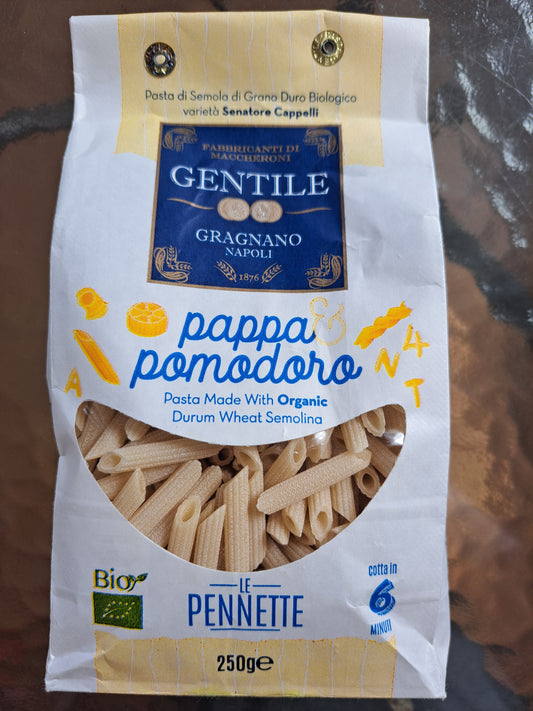 Pasta package with Gentile Gragnano Napoli branding on a reflective surface