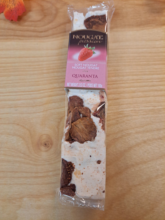 Packaged chocolate bar on a wooden surface