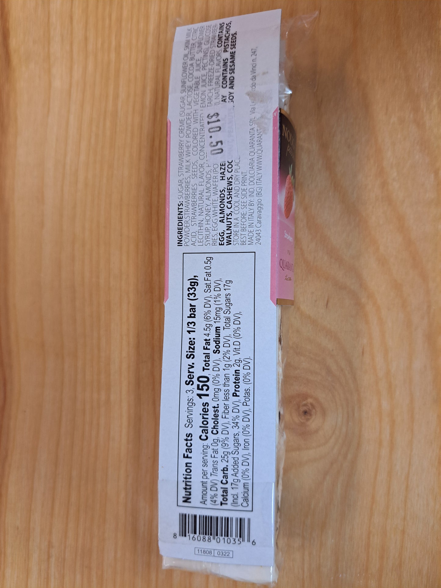 Product packaging with a label on a wooden surface