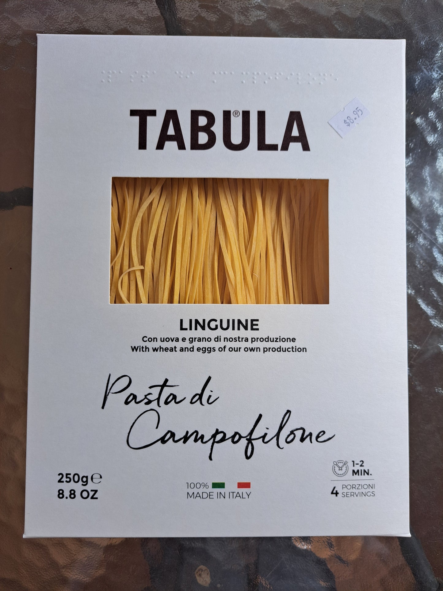 Box of Tabula Pasta di Campofilone linguine pasta on a dark surface