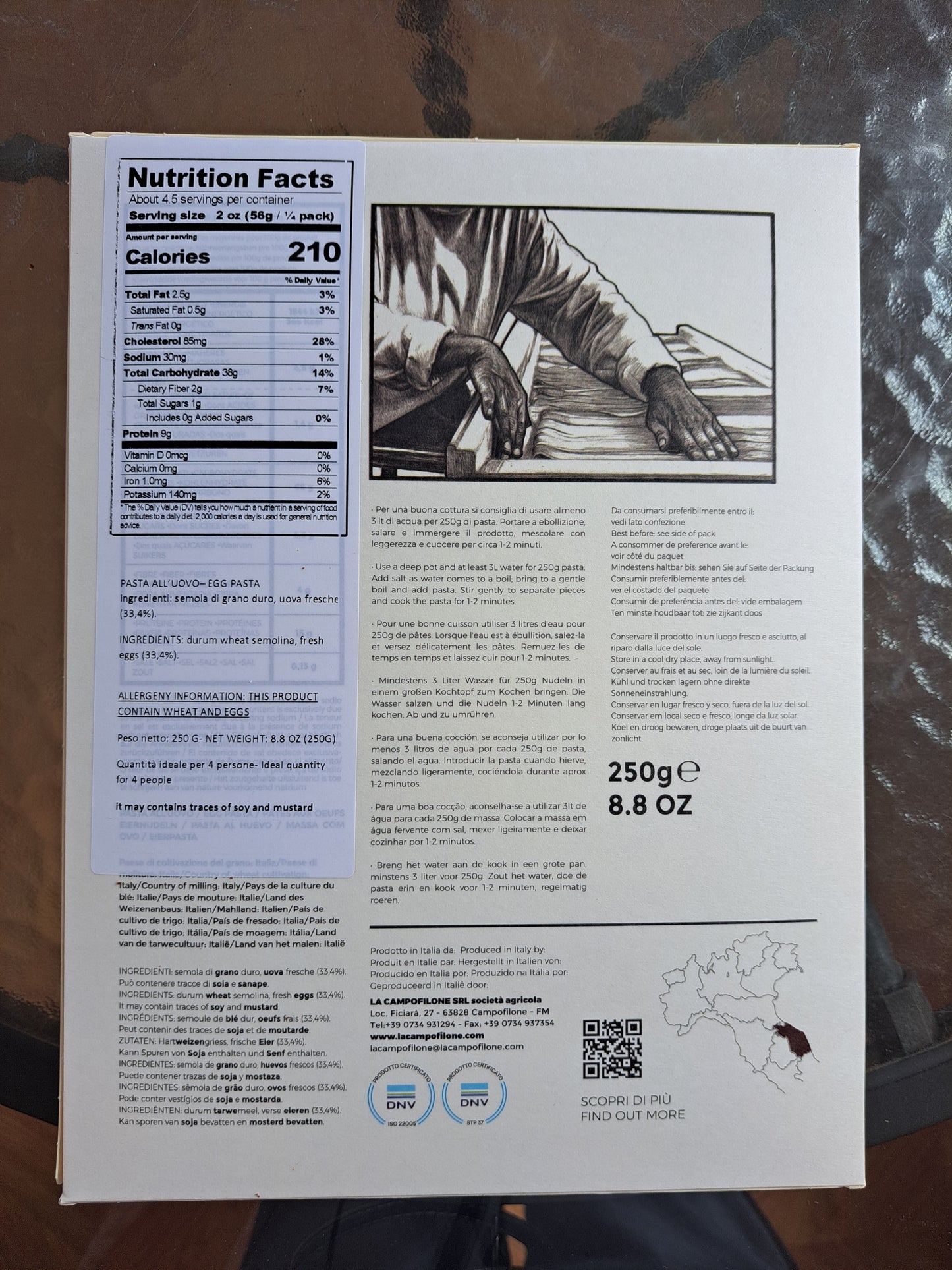 Product packaging with text, graphics, and a barcode on a textured surface