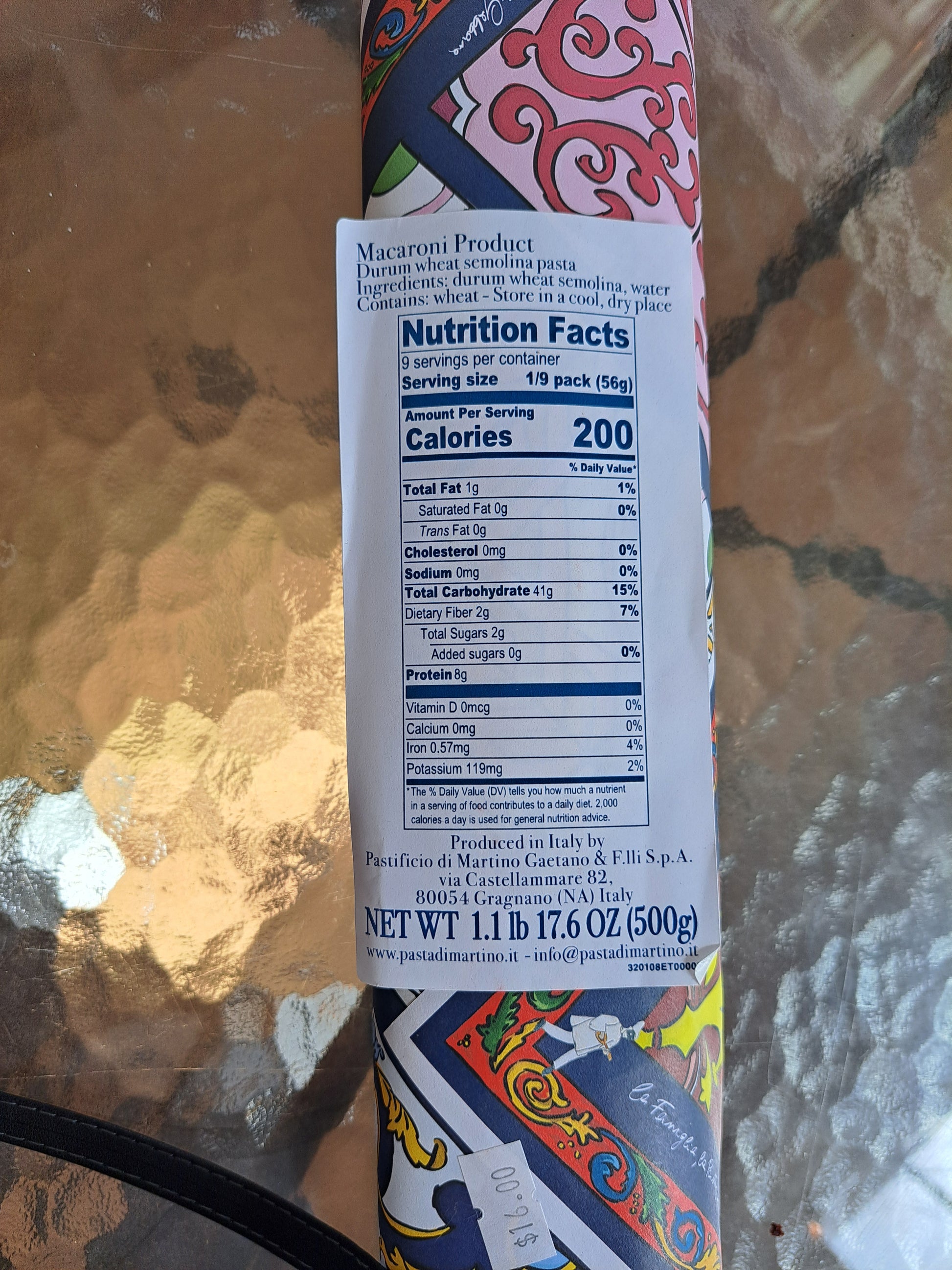 Pasta package with nutrition facts label on a reflective surface