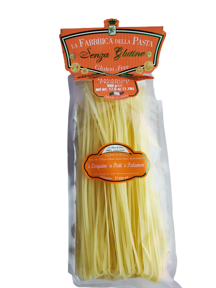 Packaged gluten-free pasta branded as La Fabrica, showing a clear window of the pasta inside the packaging with a label on top.
